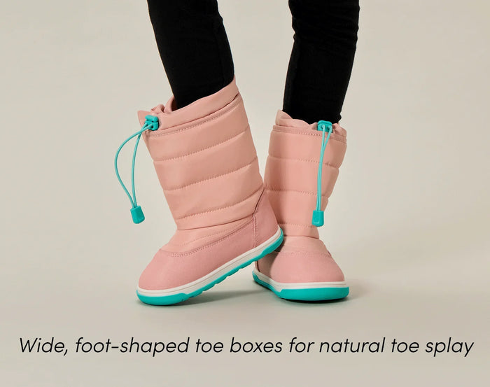 Child wearing Ten Little Snow Boots with wide, foot-shaped toe boxes for nature toe splay - Blush Pink. Available at www.tenlittle.com