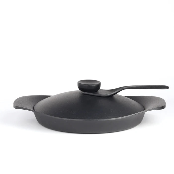 Sori Yanagi designed stove top grill pan on white background.