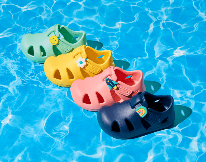Side view of Ten Little Splash Sandals 2 with Splash Sandal Charms 2 - Assorted Colors. Available at www.tenlittle.com