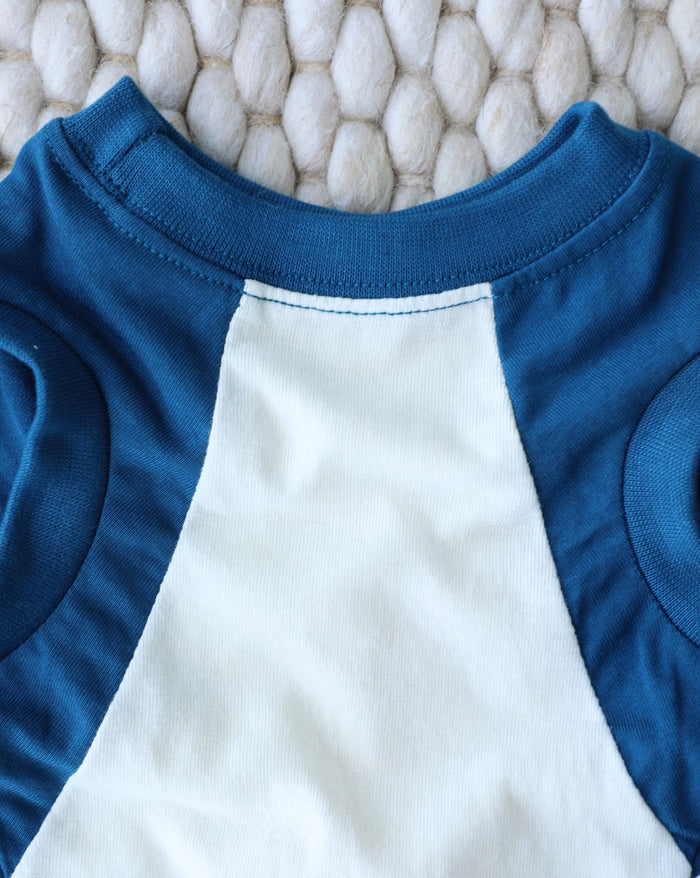 Athletic blue muscle cut dog shirt for movement and comfort, great for Corgis, Cavaliers, Mini Poodles, and medium sized dogs