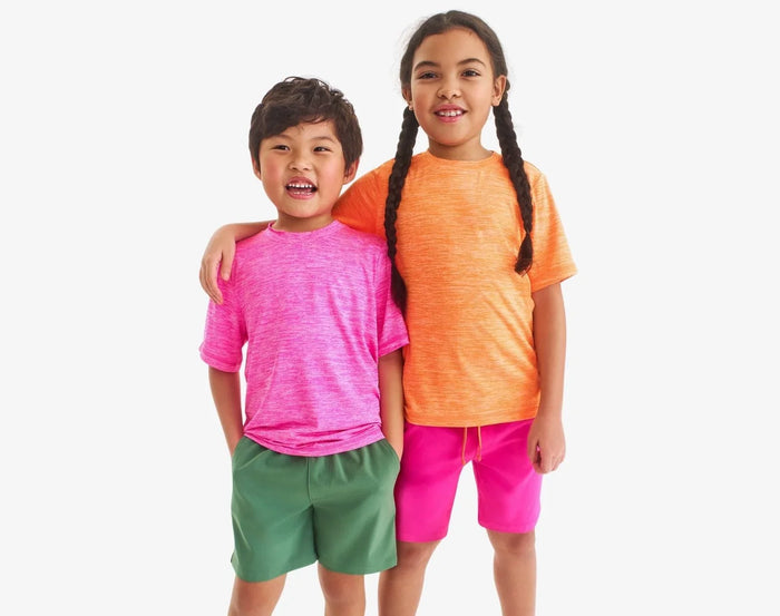 Children wearing Primary StayCool Classic Tee - Dragonfruit and Cantaloupe. Available at www.tenlittle.com
