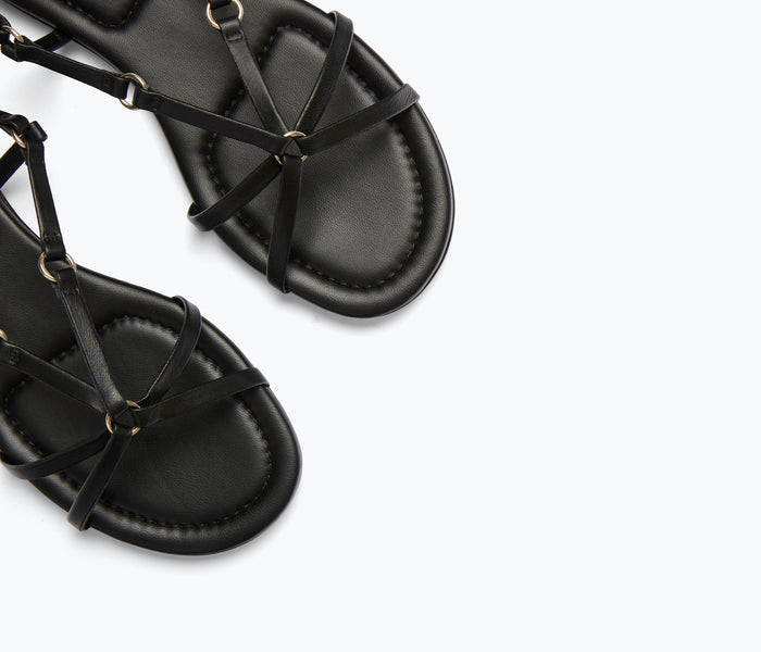 Freda Salvador Stella black sandal featuring a calf leather strap and stylish design, perfect for casual or dressy occasions.