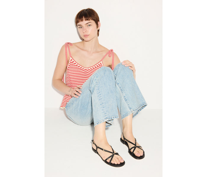 Black Stella sandal by Freda Salvador featuring a sleek design with a comfortable strap and stylish ankle closure.