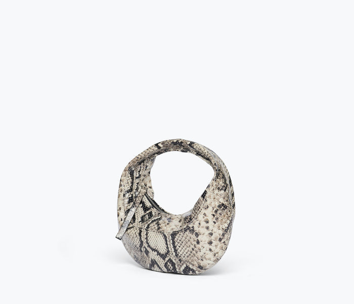 Freda Salvador Suki Mini Hobo Bag in black snake embossed leather, side view showing compact design and sleek strap.