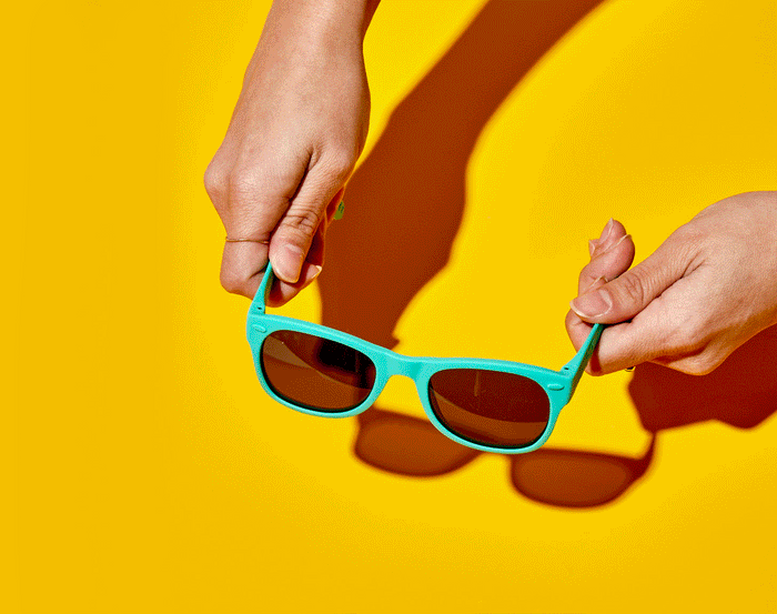 GIF flexing Ten Little Sunglasses - Teal. Available at www.tenlittle.com
