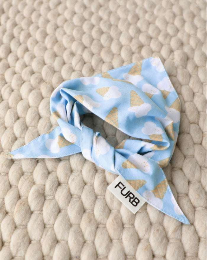 Stylish blue dog bandana for Cocker Spaniels, Pomeranians, and Mini Aussies. Perfect for park walks or playful outings.