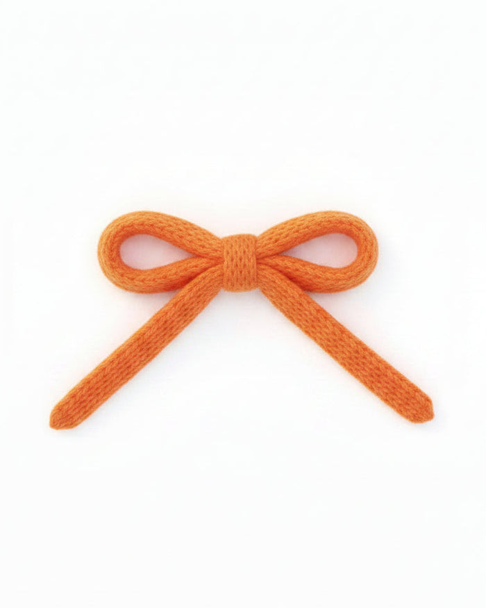 Dolce orange dog hair bow with vibrant stylish design and soft grooming accessory fabric. Updated June 2026.