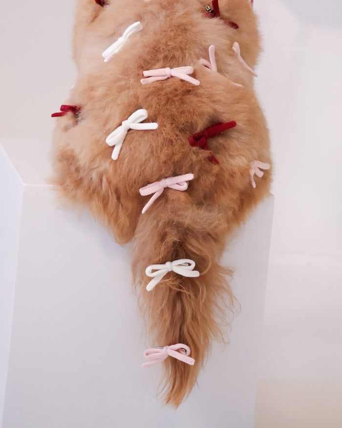 Cute pink dog bow with soft texture for everyday stylish pet outfits. Updated June 2026.
