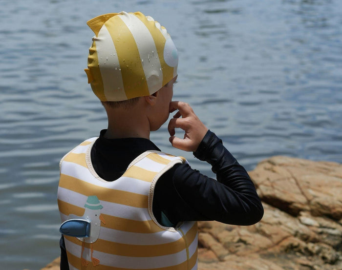 Boy wearing Sunnylife Swimming Cap - Fish. Available at www.tenlittle.com
