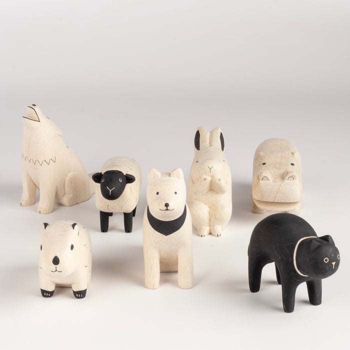 T-lab wooden animals are handmade in Bali from albizia wood, a lightweight fast-growing wood from the South Pacific. A dog, black cat, speckled sheep, a capybara, rabbit, howling wolf and hippo and cow.