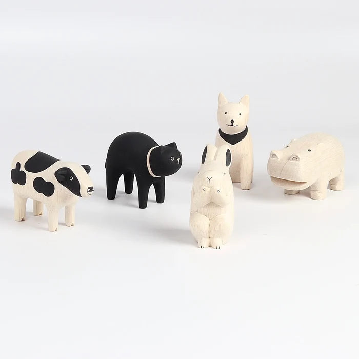 A selection of lightweight figurines or toys in wood from Japanese design company T-Lab.