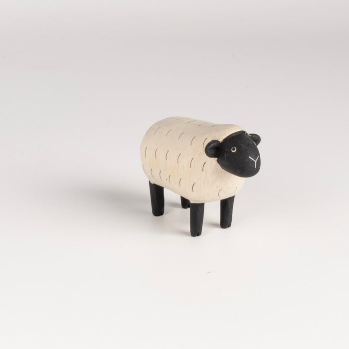 T-lab wooden sheep. These toy or figurine animals are handmade in Bali from albizia wood, a lightweight fast-growing wood from the South Pacific.