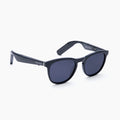 The Nautica Tailwind sunglasses feature black polarized UV400 lenses with a classic round frame, showcased against a plain white background.