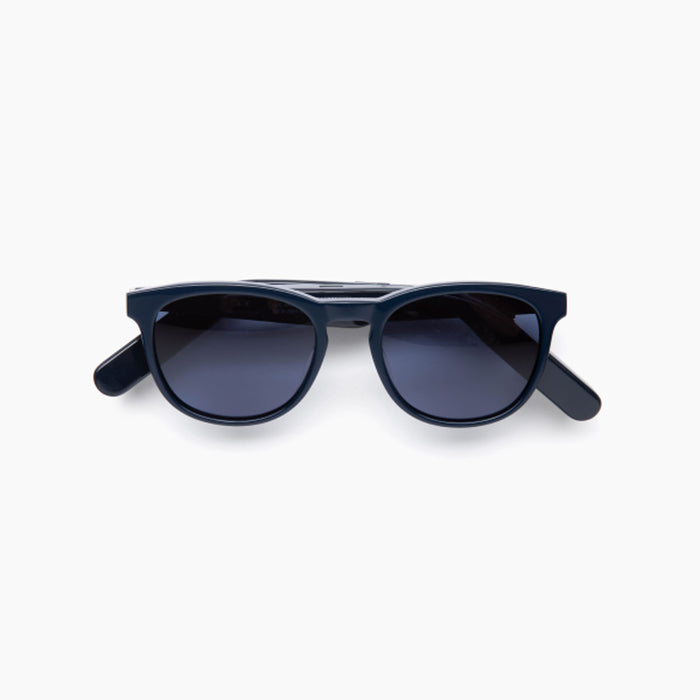 The Nautica Tailwind sunglasses feature black polarized UV400 lenses with a dark tint, showcased on a plain white background.