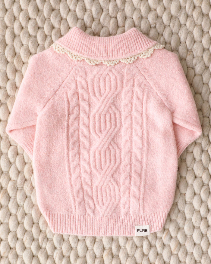 Cable knit dog sweater in gentle pink, comfortable and stylish for everyday wear, loved by dachshunds, cavapoos, and shih tzus