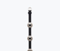 Black suede TESS belt by Freda Salvador, featuring a sleek design and metal buckle, displayed on a neutral background.