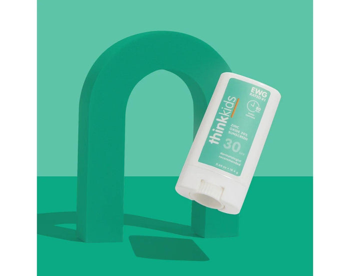 Thinksport Kids Sunscreen Stick SPF 30 in green background - Available at www.tenlittle.com