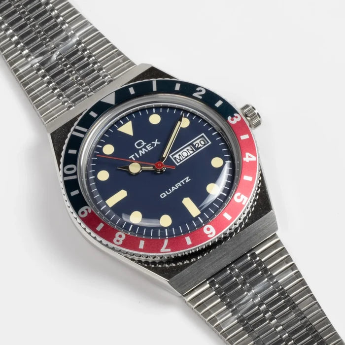 Timex Q Diver Reissue Watch Blue Face, Blue and red bezel 38mm on white background.