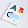 Touch Think Learn ABC book on white background.