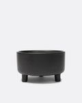 Treat Yourself Black Ceramic Dog Bowl shown with a small Pomeranian, elevated design for comfortable feeding.