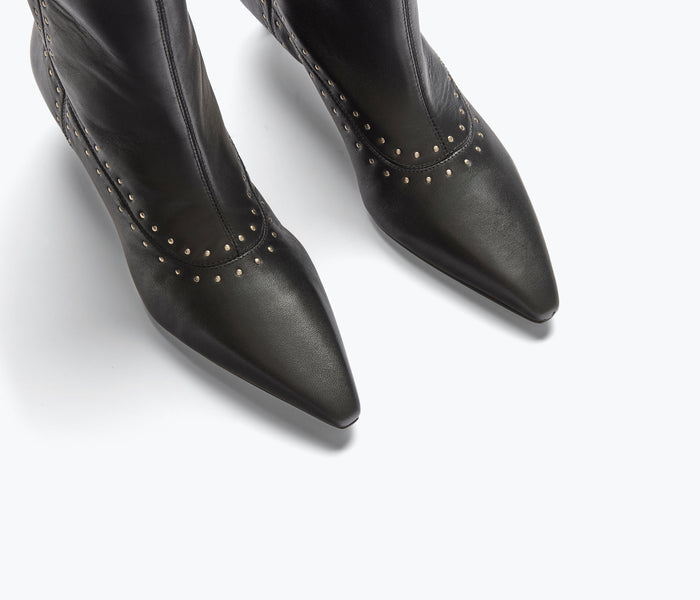 Black Tricia studded boot by Freda Salvador with detailed stud embellishments and sleek calf-length design.