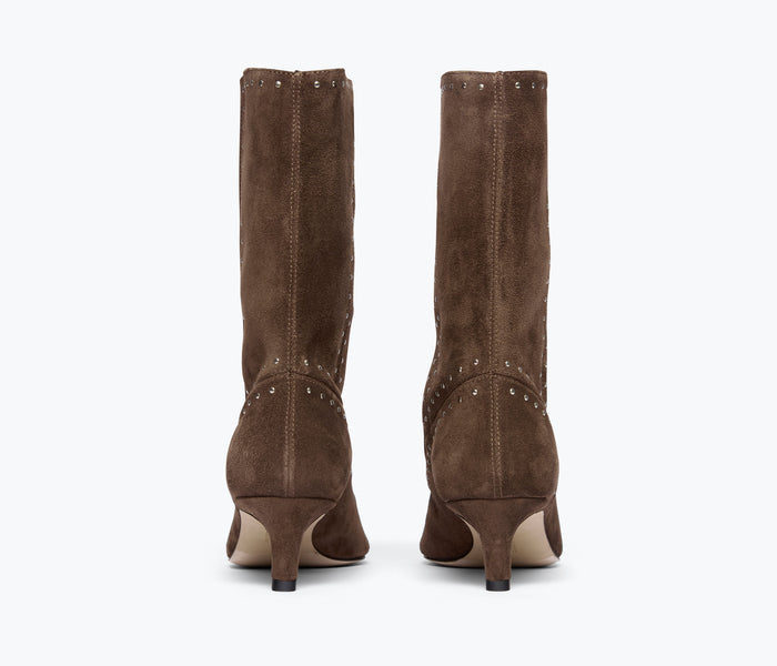 Freda Salvador Tricia studded suede boot showing back view with decorative studs and plush heel detail.