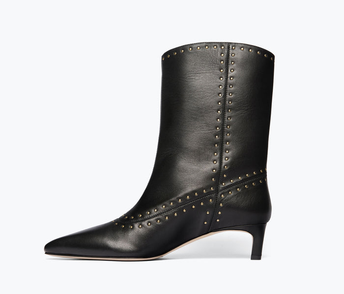 Black calf leather Tricia studded boot by FREDA SALVADOR, showing the inside view with silver studs and textured leather design.