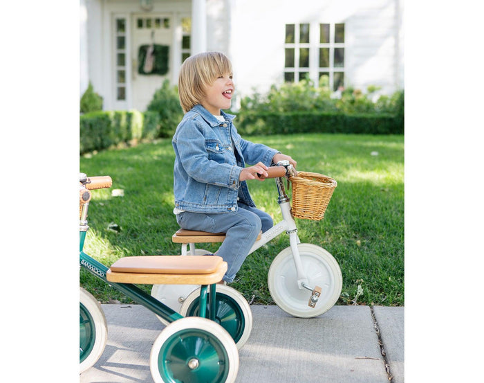 Boy riding Banwood Trike in White. Available from tenlittle.com