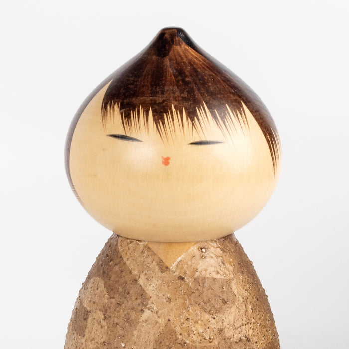 Close up of vintage kokeshi doll by Misao Watanabe.