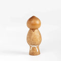 An artisan Kokeshi dolls called Mushin (Innocense) in small. These depict a child with a boyish look. Handmade in Japan by Misao Watanabe (1917-2007), possibly the most popular Sosaku artisans. He won the Prime Minister's Prize in 1963 and 1981.