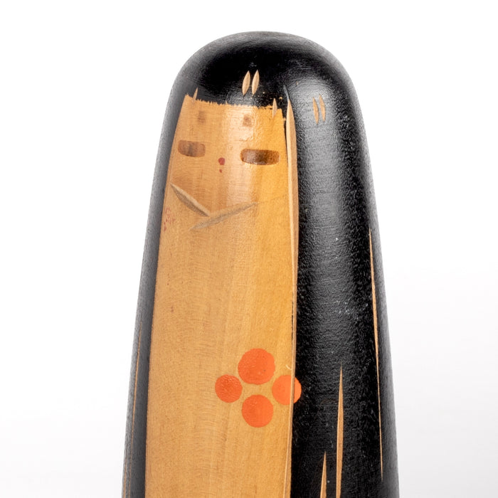 Close up of Vintage Kokeshi by  by Yamanaka Sanpei.