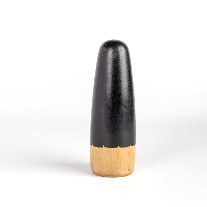 Back of kokeshi doll.