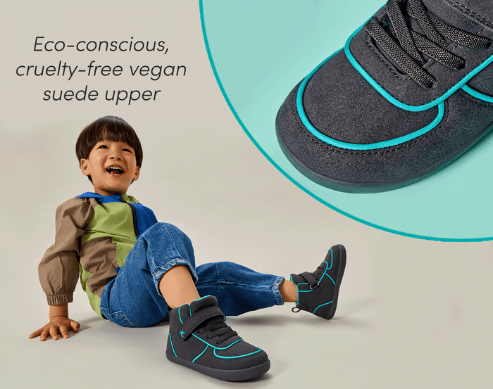 Split view close-up of eco-conscious, cruelty-free vegan suede upper and child sitting wearing Ten Little Volt High Tops. Available at www.tenlittle.com