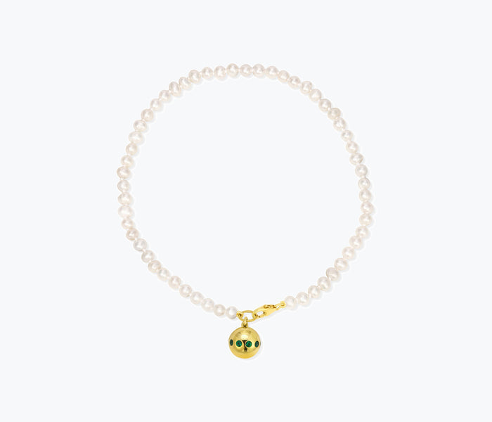 Elegant white pearl anklet by Monbouquette featuring a delicate chain and pearl accents, perfect for adding a touch of sophistication.