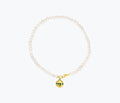 Elegant white pearl anklet by Monbouquette featuring a delicate chain and pearl accents, perfect for adding a touch of sophistication.