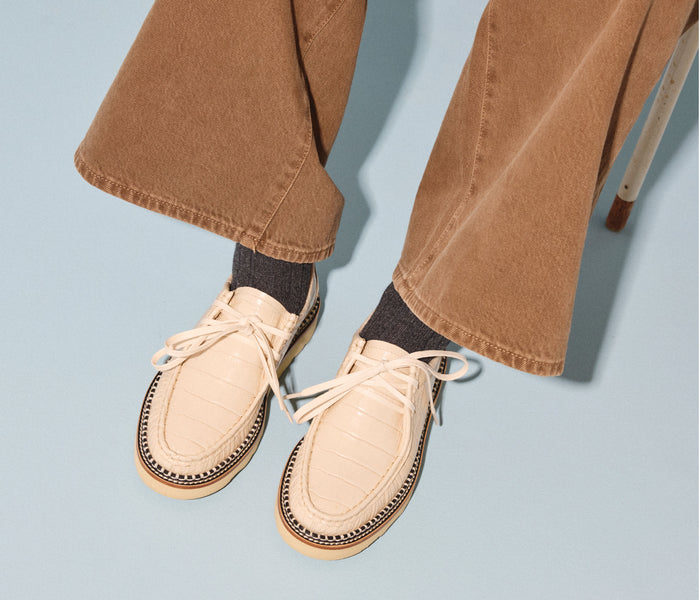 Freda Salvador Willow Lug Moccasin loafer in sand embossed crocodile leather, featuring a stylish and comfortable slip-on design.