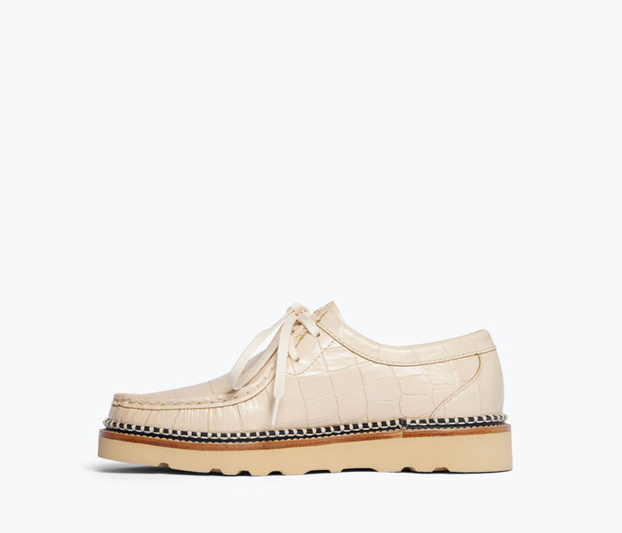 Freda Salvador Willow Lug Moccasin loafer in sand embossed crocodile leather, showing detailed inside view.