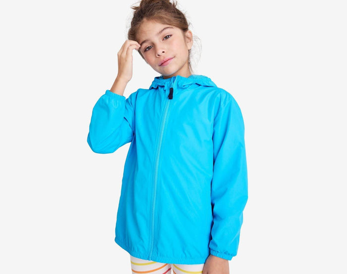 Girl wearing Primary - Windbreaker - Sea - Available at www.tenlittle.com