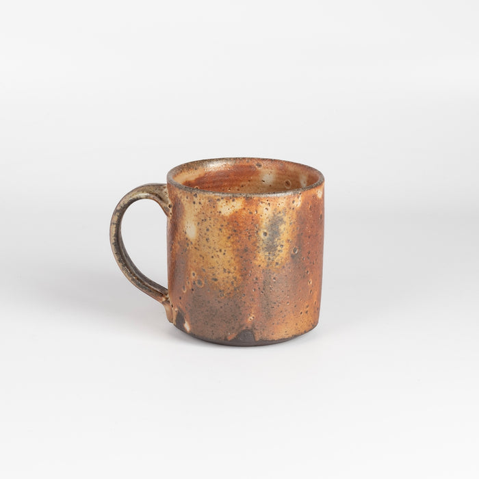 Other side of wood fired mug cup by Lindsay Oesteritter.