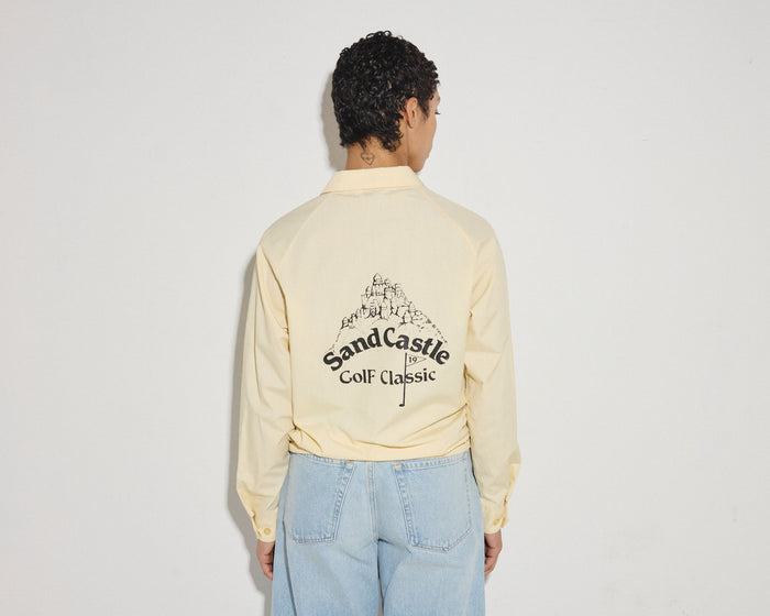 Yellow zip-up jacket from TROVE Vintage, casual apparel with a front zipper and stylish design.